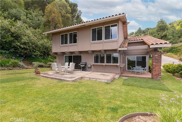 8 Via Subida, Rancho Palos Verdes, CA 90275 - back of house featuring a patio, stucco siding, a yard, and a tiled roof