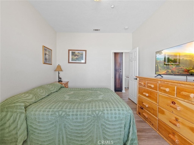 11823 Wintergreen Rd, Pinon Hills, CA 92372 - bedroom featuring light wood-style floors