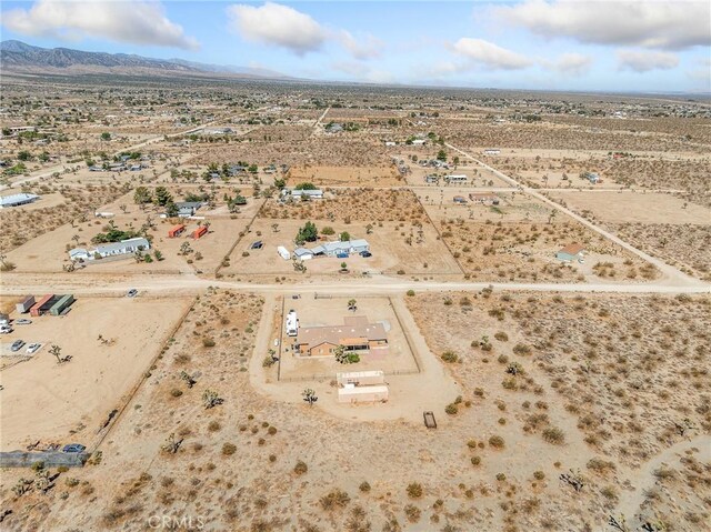 11823 Wintergreen Rd, Pinon Hills, CA 92372 - view of rural area with a desert landscape and a mountain backdrop