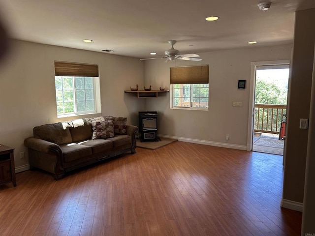 17412 Harrison Park Rd, Julian, CA 92036 - living area with hardwood / wood-style floors, a ceiling fan, a wood stove, and recessed lighting
