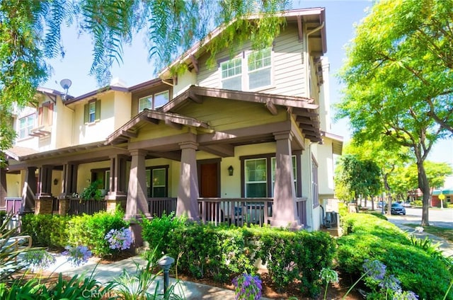 1180 Cornwell Dr, Fullerton, CA 92833 - view of front facade with stucco siding and covered porch