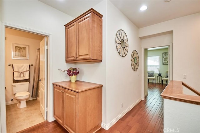 1180 Cornwell Dr, Fullerton, CA 92833 - corridor with wood finished floors and recessed lighting