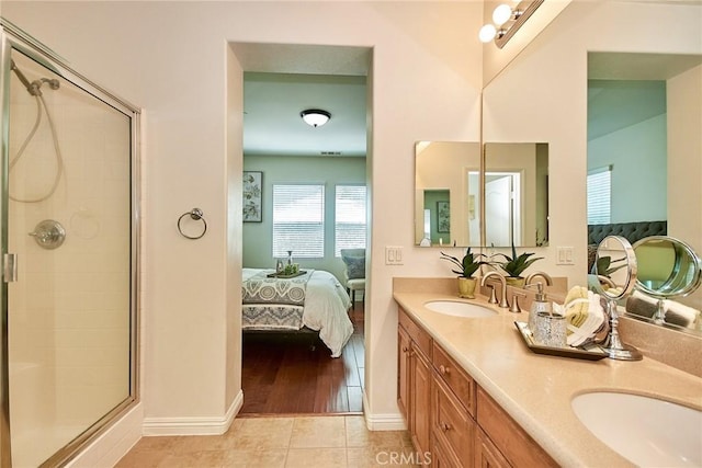 1180 Cornwell Dr, Fullerton, CA 92833 - ensuite bathroom featuring double vanity, a shower stall, and tile patterned flooring