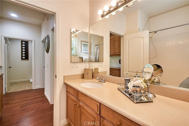 1180 Cornwell Dr, Fullerton, CA 92833 - bathroom with wood finished floors, a shower, and vanity