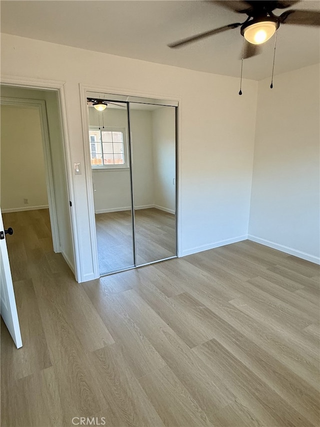 11117 Maidstone Ave, Norwalk, CA 90650 - unfurnished bedroom with light wood-type flooring, a closet, and ceiling fan