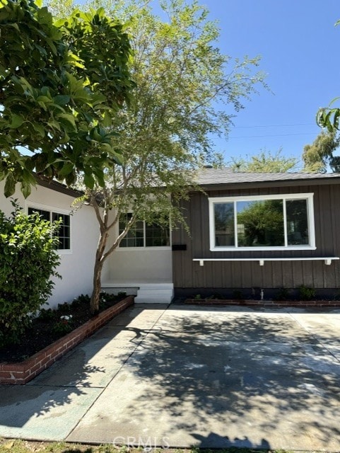 11117 Maidstone Ave, Norwalk, CA 90650 - property entrance featuring board and batten siding