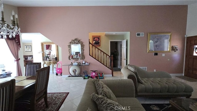 8467 Penfield Ave, Winnetka, CA 91306 - living area with stairway and light tile patterned flooring