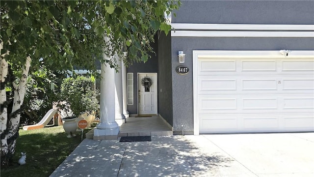 8467 Penfield Ave, Winnetka, CA 91306 - entrance to property with concrete driveway and stucco siding