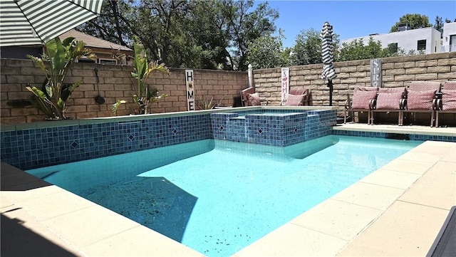 8467 Penfield Ave, Winnetka, CA 91306 - view of pool with a pool with connected hot tub