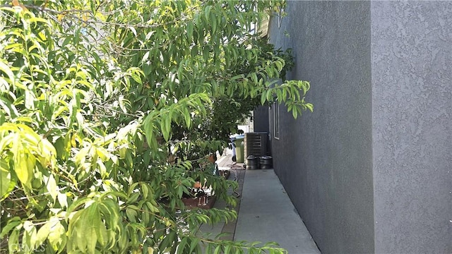 8467 Penfield Ave, Winnetka, CA 91306 - view of property exterior featuring stucco siding and a cooling unit