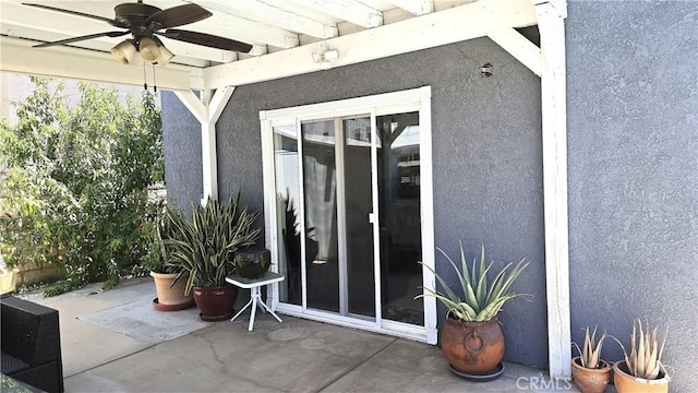 8467 Penfield Ave, Winnetka, CA 91306 - entrance to property featuring a ceiling fan, stucco siding, and a patio