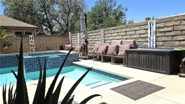 8467 Penfield Ave, Winnetka, CA 91306 - view of pool featuring a patio area and a pool with connected hot tub