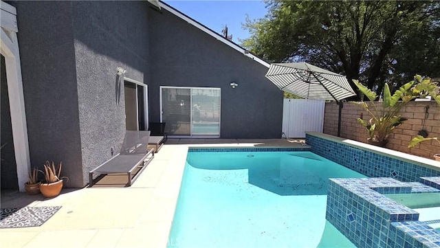 8467 Penfield Ave, Winnetka, CA 91306 - view of swimming pool featuring a pool with connected hot tub and a patio