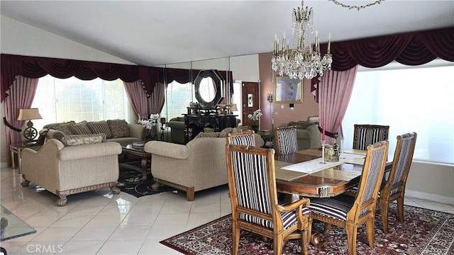 8467 Penfield Ave, Winnetka, CA 91306 - dining room featuring a chandelier, light tile patterned floors, and lofted ceiling
