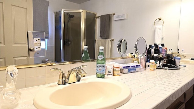 8467 Penfield Ave, Winnetka, CA 91306 - bathroom with a shower stall and double vanity