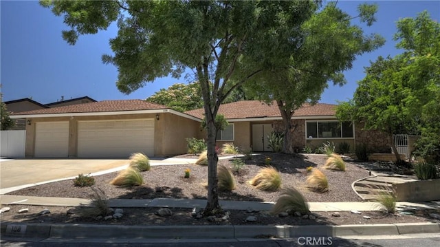 108 Limestone Rd, Claremont, CA 91711 - single story home with an attached garage, driveway, and stucco siding