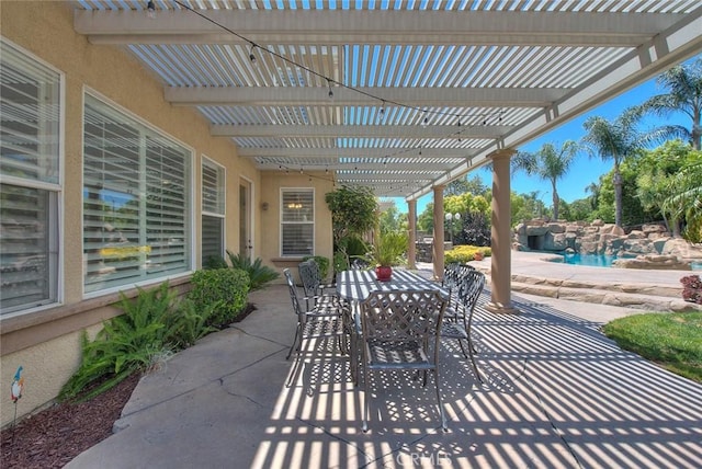 14182 Whitebark Ave, Chino, CA 91710 - view of patio featuring a pergola, outdoor dining space, and an outdoor pool