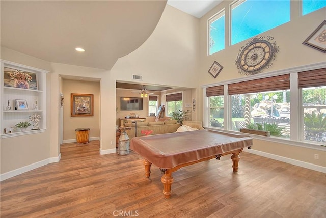 14182 Whitebark Ave, Chino, CA 91710 - rec room featuring healthy amount of natural light, wood finished floors, a towering ceiling, billiards, and ceiling fan
