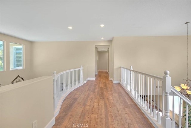14182 Whitebark Ave, Chino, CA 91710 - hallway featuring an upstairs landing, wood finished floors, and recessed lighting