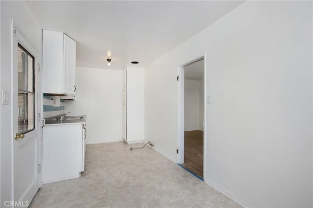2210 W 7th St, Santa Ana, CA 92703 - kitchen with white cabinets and light countertops