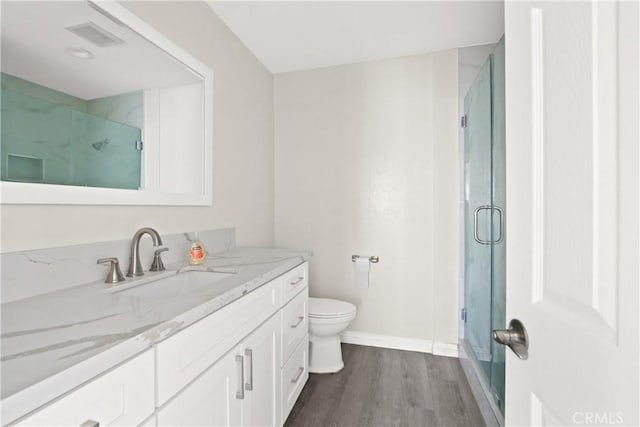 1001 W Macarthur Blvd Unit 20, Santa Ana, CA 92707 - full bathroom with vanity, a marble finish shower, and wood finished floors
