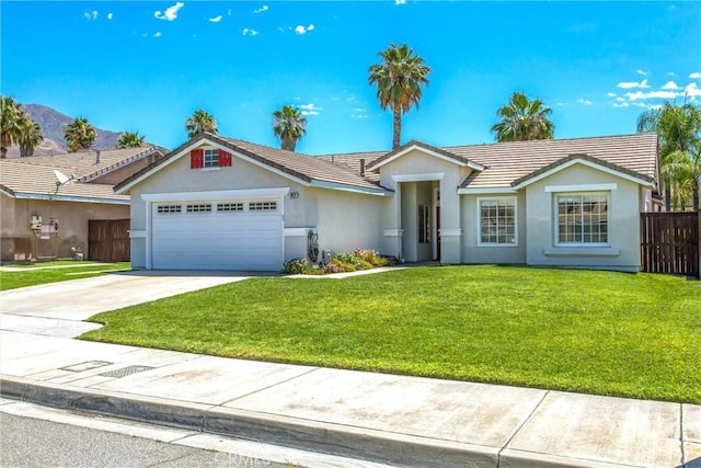 7471 Windrose Dr, Highland, CA 92346 - ranch-style house with a garage, driveway, stucco siding, and a tiled roof