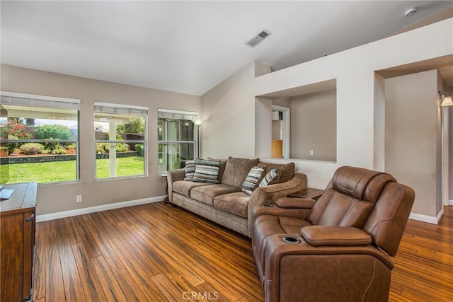 7471 Windrose Dr, Highland, CA 92346 - living area with baseboards and dark wood-style floors