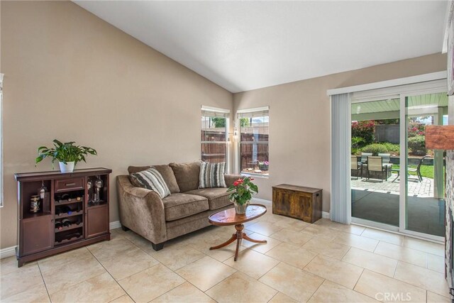 7471 Windrose Dr, Highland, CA 92346 - living room with vaulted ceiling and baseboards