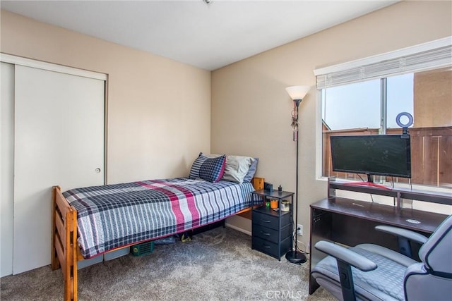 7471 Windrose Dr, Highland, CA 92346 - bedroom with carpet flooring and a closet