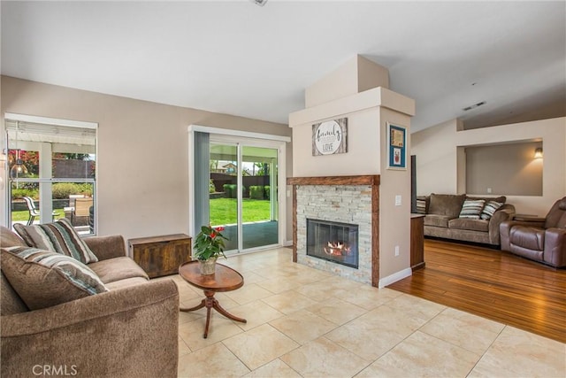 7471 Windrose Dr, Highland, CA 92346 - living room with a fireplace and light tile patterned flooring