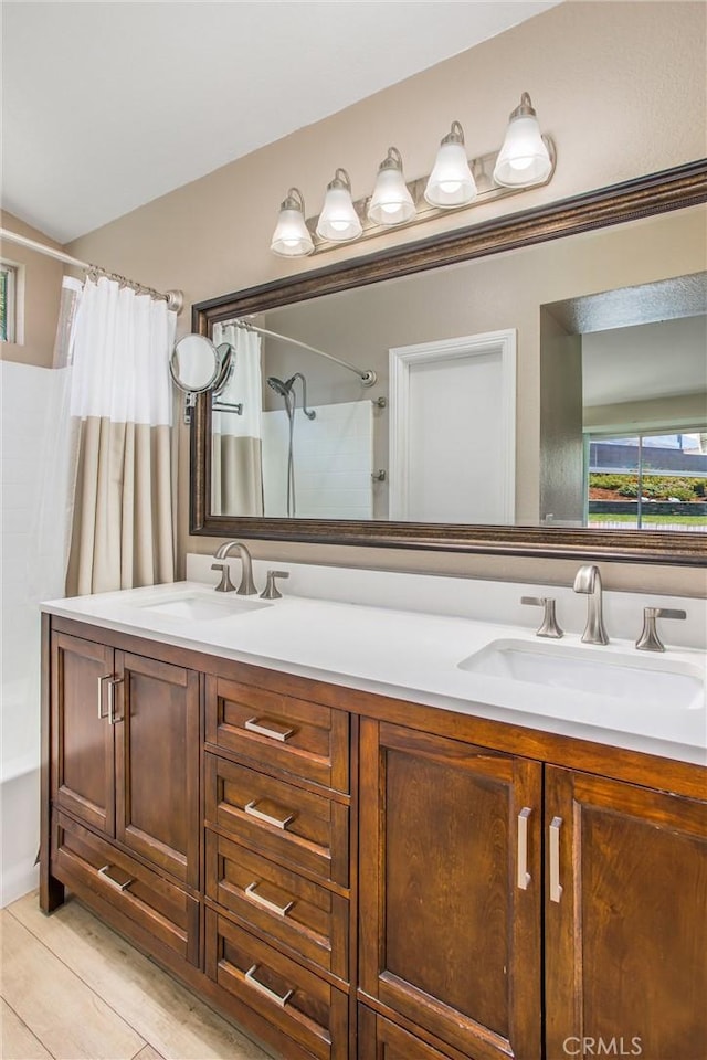 7471 Windrose Dr, Highland, CA 92346 - full bath featuring double vanity and shower / bath combination with curtain