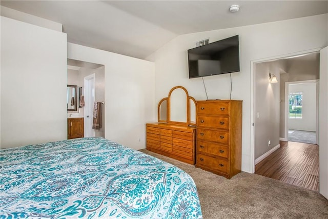 7471 Windrose Dr, Highland, CA 92346 - carpeted bedroom with vaulted ceiling