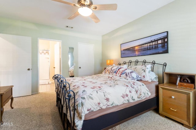 6613 Sargent Ln Unit 86, Ventura, CA 93003 - bedroom featuring carpet floors, connected bathroom, and a ceiling fan