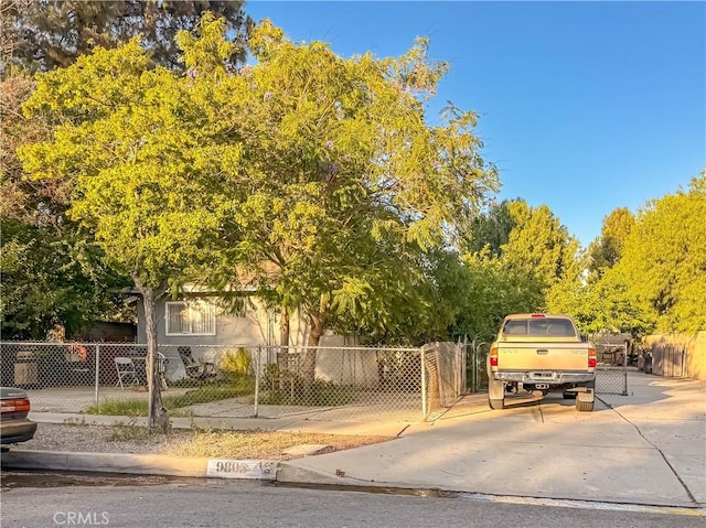 9803 Juniper Ave, Fontana, CA 92335 - view of front of home with a fenced front yard
