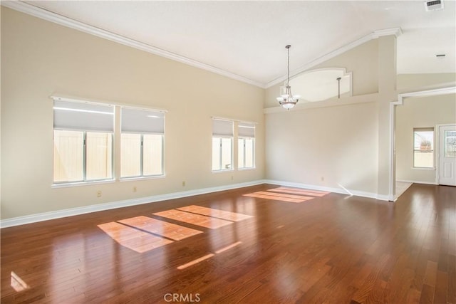 769 Amber Sky St, Banning, CA 92220 - spare room with a chandelier, wood finished floors, crown molding, and high vaulted ceiling