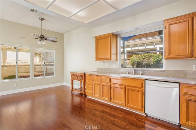 769 Amber Sky St, Banning, CA 92220 - kitchen featuring white dishwasher, light countertops, ceiling fan, and dark wood-style floors