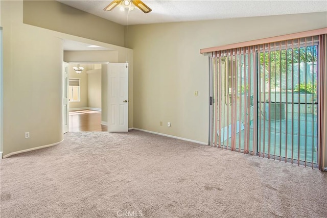 769 Amber Sky St, Banning, CA 92220 - carpeted spare room featuring a ceiling fan, vaulted ceiling, and a textured ceiling