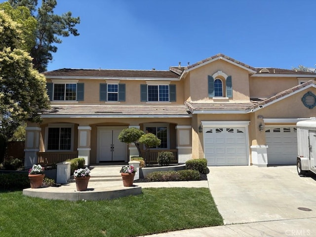 33691 Salvia Ln, Murrieta, CA 92563 - view of front of property with stucco siding, concrete driveway, a garage, a porch, and a tile roof