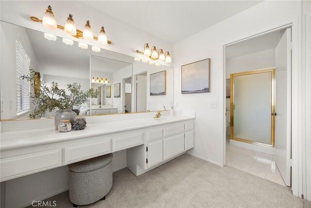 18312 Hartlund Ln, Huntington Beach, CA 92646 - full bath featuring a shower stall, vanity, carpet, and tile patterned flooring