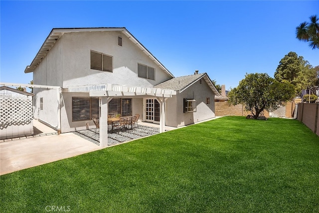 18312 Hartlund Ln, Huntington Beach, CA 92646 - back of house featuring stucco siding, a fenced backyard, a patio area, and a pergola
