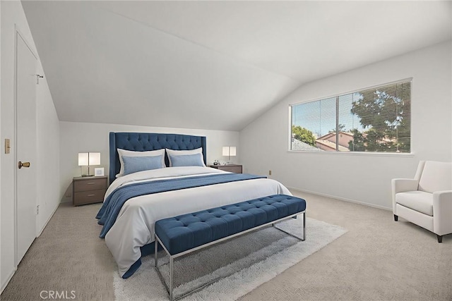18312 Hartlund Ln, Huntington Beach, CA 92646 - carpeted bedroom featuring vaulted ceiling and baseboards