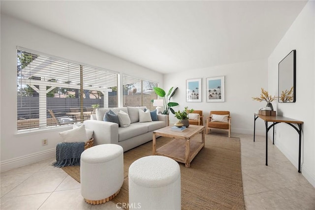 18312 Hartlund Ln, Huntington Beach, CA 92646 - living room with light tile patterned floors