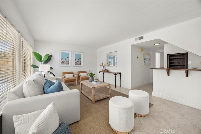 18312 Hartlund Ln, Huntington Beach, CA 92646 - living area featuring baseboards and light tile patterned floors