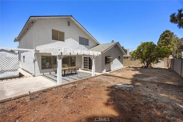 18312 Hartlund Ln, Huntington Beach, CA 92646 - back of property with stucco siding, a fenced backyard, a patio area, and a pergola