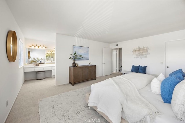18312 Hartlund Ln, Huntington Beach, CA 92646 - bedroom with light carpet and connected bathroom