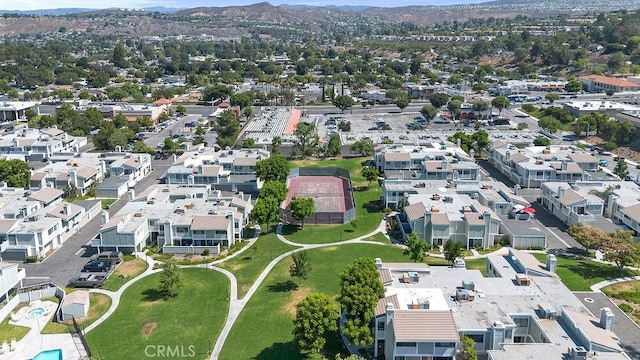 27066 Hidaway Ave Unit 6, Canyon Country, CA 91351 - aerial view of property and surrounding area featuring a mountainous background and nearby suburban area