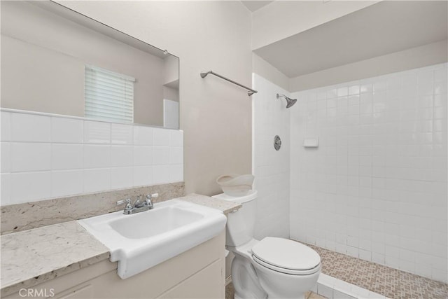 26480 Ridgemoor Rd, Menifee, CA 92586 - full bathroom with a tile shower, vanity, and backsplash