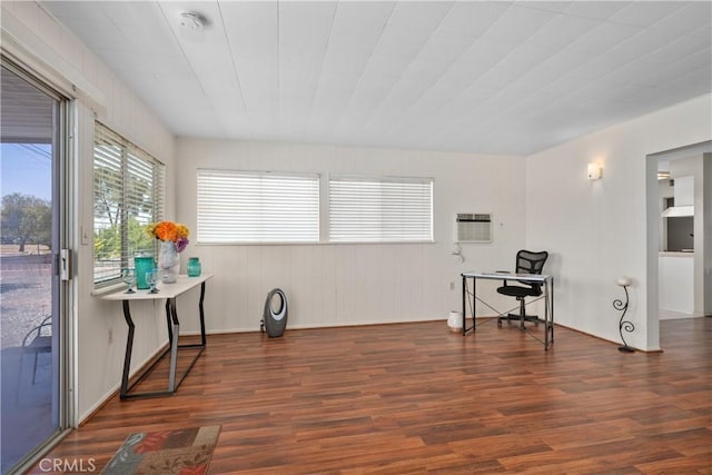 26480 Ridgemoor Rd, Menifee, CA 92586 - sitting room with wood finished floors, a desk, and an AC wall unit