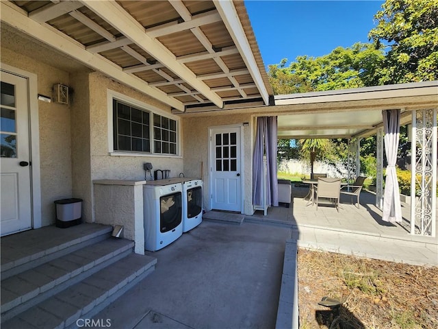 8420 E Hermosa Dr, San Gabriel, CA 91775 - view of patio / terrace featuring washer and dryer and outdoor dining area