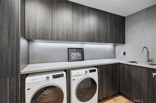 1061 Skyline Dr, Laguna Beach, CA 92651 - washroom featuring washer and clothes dryer and cabinet space